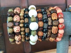 WE HAVE A TON OF OTHER WOOD BEAD BRACELETS!  CLICK BELOW TO SEE ALL STYLES. https://www.etsy.com/shop/BeautifulByTheBauers?ref=shop-header-name&listing_id=1563599230&section_id=44879093 Check out the rest of our Etsy shop : ) One size fits most adults and big kiddos. Worried about needing needing a smaller or bigger size? Just send me a message! Discover the essence of Bohemian elegance with our Handmade Boho Style Wood Bead Bracelets. Crafted with care and creativity, each of these bracelets is Clothespin Diy Crafts, Wooden Bead Jewelry, Wood Beads Jewelry, Nut Bracelet, Earthy Jewelry, Wood Bead Bracelet, Ceramic Necklace, Wood Bracelet, Accessories Style