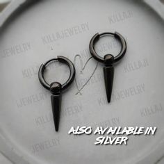 Super trendy punk style Huggie hoop spike earrings in black. Unisex. These earrings are made from 100% stainless steel so will not tarnish or discolour. Available as a single earring or as a pair. Also available in silver. Hoops measure 17mm Length of spike: 21mm 💕 You will receive these earrings gift wrapped ready to give as a gift to someone special or as a special treat for yourself! 💕 Black Edgy Nickel-free Cartilage Earrings, Edgy Black Nickel-free Cartilage Earrings, Edgy Black Earrings For Streetwear, Punk Style Stainless Steel Cartilage Earrings, Punk Stainless Steel Pierced Cartilage Earrings, Trendy Black Metal Cartilage Earrings, Black Punk Cartilage Earrings Internally Threaded, Punk Black Internally Threaded Cartilage Earrings, Black Punk Internally Threaded Cartilage Earrings