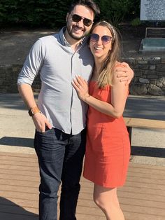 a man and woman standing next to each other