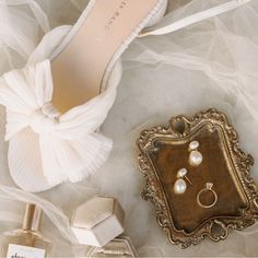 an assortment of wedding accessories including shoes and jewelry