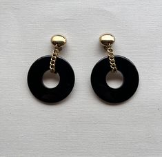 Vintage Retro gold tone accents black dangle clip on earrings in great vintage condition. The black is made of plastic. The earrings are not heavy on the ear. Clip On, Clip On Earrings, The Black, Etsy Earrings, Retro Vintage, Gold Tones, Jewelry Earrings, Accessory Gift, Electronic Accessories