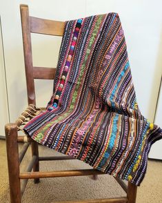 Beautiful vintage throw or decorative blanket in stunning colors from the Sololá region in Guatemala. This traditional Guatemalan fabric also features the beautiful, randa embroidery work Guatemalan weavers are famous for. This is an unaltered, vintage fabric. Size: 38 x 36 inches.  All of our pieces are made from handmade vintage traditional clothing from Guatemala in combination with cotton fabrics. Your purchase supports indigenous women in Guatemala and their families.  Every piece is one-of Bohemian Embroidered Multicolor Shawl, Bohemian Multicolor Embroidered Shawl, Artisan Multicolor Woven Motifs Dupatta, Multicolor Woven Motifs Dupatta For Festival, Bohemian Shawl With Traditional Multicolor Embroidery, Bohemian Shawl With Multicolor Embroidery And Traditional Patterns, Folk Style Multicolor Dupatta With Woven Motifs, Multicolor Folk Dupatta With Woven Motifs, Traditional Handwoven Multicolor Dupatta