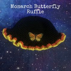 This crochet black, Orange, and Yellow Monarch Butterfly Ruffle bucket hat is part of our ruffle collection and features a cute Ruffle design on the bottom, It also includes a faux Leather name tag and a gem rivet. With a head circumference of 21-23 inches, it is made from black, yellow, and Orange  acrylic yarns for the base and brim, and the ruffles, Whether you're looking to add some flair to your outfit or need a hat for a day at the beach, this is the perfect choice! If you would prefer a different color combination, please feel free to message us. Thank you for visiting our store! Necklace not included just a prop  More colors coming in this design  Come check out my new shop site as well: https://www.Calypsopeacock.com One Size Black Crochet Hat For Spring, One Size Black Brimmed Bucket Hat, Black Crochet Brimmed Hat, Black Crochet Beanie For Spring, Black Crochet Bucket Hat For The Beach, Black Crochet Bucket Hat One Size, Black Crochet Festival Hat One Size, Black Crochet Hat For Festivals (one Size Fits Most), Black Crochet Hat For Festivals