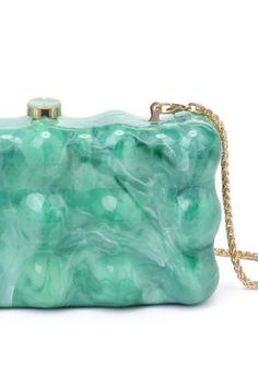 Waverly Clutch Marbled green bubble clutch. Structured design Top clasp closure Gold hardware Detachable chain link strap Dimensions: 7.5" L x 2.4" W x 4.2" H Green Rectangular Evening Bag With Chain Strap, Green Evening Bag With Chain Strap, Green Clutch With Chain Strap, Green Clutch Evening Bag, Green Clutch With Chain Strap For Formal Occasions, Green Formal Clutch With Chain Strap, Elegant Green Evening Bag With Chain Strap, Formal Green Clutch With Chain Strap, Elegant Green Evening Bag