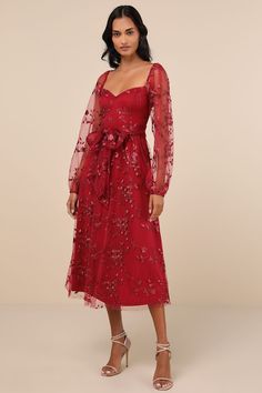 You'll twirl your way into everyone's heart in the Lulus Darling Charisma Wine Red Mesh Embroidered Midi Dress! Elegant floral embroidered mesh shapes a sweetheart neckline (with hidden no-slip strips) and sheer, long balloon sleeves (with elasticized shoulders and cuffs) that can be styled on or off the shoulders. A tying sash belt punctuates the high waist that sits atop a flowy skater skirt that ends at a chic midi hem. Hidden back zipper/clasp. Fit: This garment fits true to size. Length: Mid-calf length. Size medium measures 47.5" from shoulder to hem. Bust: Great for any cup size. Waist: Fitted - very fitted at natural waist. Hip: Not Fitted - fuller skirt allows room for hips. Undergarments: May be worn with a strapless bra, adhesive bra, petals, or no bra. Fabric: Fabric has no str Fall Cocktail Dress With Sweetheart Neckline, Fitted Floral Embroidery Dress For Holiday, Red Prom Dress With Floral Embroidery, Fitted Embroidered Dresses With Sweetheart Neckline, Red Floral Embroidered Prom Dress, Red Floral Embroidered Dress For Fall, Red Floral Embroidered Knee-length Dress, Red Knee-length Dress With Floral Embroidery, Red Embroidered Knee-length Dress