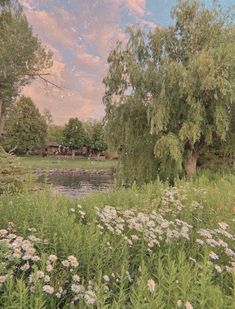 a painting of a pond surrounded by trees and flowers