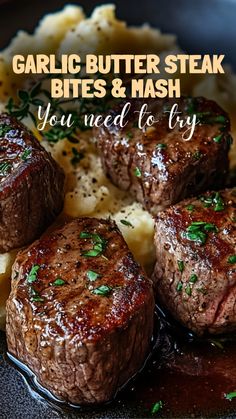 some steaks and mashed potatoes on a plate with the words garlic butter steak bites & mash you need to try