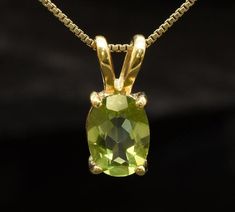 Gold Peridot Pendant set with a Natural Peridot - top grade (Brazil); diamond cut & stunning green color, 8x6mm, 2 Carats. Gold Solitaire Pendant design made of Solid 925 Sterling Silver ☞ made to last. Matching Pendant & Earrings - please ask me Details : ♥ Each item packaged in a cute GIFT BOX ✓ ♥ GUARANTEE on the materials ✓ ♥ Natural Peridot in soft green color sourced from Brazil ✓ ♥ Pure Solid 925 Sterling Silver ☞ Silver Hallmark on each piece ♕ ♥ The pendant is plated with 18k Gold (the Luxury Classic Peridot Jewelry, Luxury Peridot Pendant Necklace, Luxury Gold Peridot Necklaces, August Birthstone Necklace, Eternity Ring Gold, Peridot Jewelry, Peridot Pendant, Peridot Necklace, Dainty Pendant