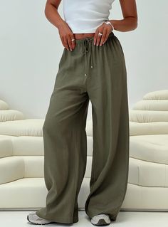 Linen pants Elasticated waistband with drawstring fastening, twin hip pockets, wide-leg Non-stretch, unlined 70% rayon 30% linen Cold gentle machine wash Olive Green Linen Pants Outfit, Stretch Pants Outfits, Green Linen Pants Outfit, Linen Pants Outfit Work, Olive Linen Pants, Green Linen Pants, Pretty Pants, Summer Wishlist, Aged Cheese