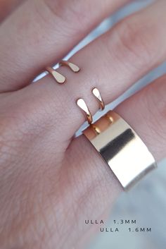 "♦ This is a PREORDER which ships out in 1-3 weeks ♦ [ Listing is for One Ring ] Simple, solid 14K yellow gold open cuff ring wear alone or stack 2 or 3 for texture perfect everyday ring. ► 14K Gold ring is about 1.3mm thick(slim) // This style can be customized // Thickness: 1.3mm, 1.6mm, 2mm Gap Width: 2mm - 7mm Metal: 14k Yellow Gold, 18k Yellow Gold, 10K Yellow Gold, 14K Rose Gold, 18K Rose Gold, 14K White Gold Please convo me with ring size & desired specifications for a price quote. ♦ ♦ ♦ Minimalist Double Band Stackable Promise Rings, Minimalist Tarnish-resistant Stackable Promise Rings, Rose Gold Stackable Open Band Rings, Modern Stackable Midi Rings For Promise, Dainty Open Ring Stackable Rings With Polished Finish, Stackable Rose Gold Open Band Midi Rings, Stackable Rose Gold Midi Rings With Open Band, Minimalist Open Band Jewelry For Promise, Rose Gold Stackable Midi Rings With Open Band