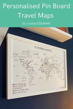 the personalised pin board map is hanging on the wall