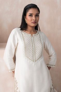 Ivory kurta with sequin bead embellished floral jaali patterns and cut-out detail on sleeves. Comes with sharara and dupatta. - Aza Fashions Elegant White Traditional Wear With Gota Work, Elegant Off White Palazzo Set With Gota Work, White Sets With Mirror Work For Transitional Season, Traditional Cream Sharara With Mirror Work, Elegant White Kurta With Gota Work, Elegant Cream Palazzo Set With Gota Work, Elegant Chikankari Embroidery Sharara For Navratri, Elegant Off White Sharara With Gota Work, Elegant Off White Palazzo Set With Mirror Work