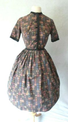 Vintage Dress 1950's Vintage Day Dress Brown Cotton Print Buttons to the waist Black Braided Trim Along the Neck, Front, Waist and Sleeves Bodice is fitted with side seam and bottom bodice darts the skirt is Pleated all the way around for a Full Gather I have it shown with and without a Crinoline, which is Not included The only tag is the size tag, which I can't read, so Please go by measurements taken laid flat seam to seam 19" armpit to armpit 11 1/2" waist 16" shoulder to waist 24 1/2" waist Bodice Darts, Shirt Waist Dress, Vintage Day Dress, Rockabilly Shirts, 40s Dress, Flat Seam, Fashion 1950s, Shirtwaist Dress, Vintage 1950s Dresses