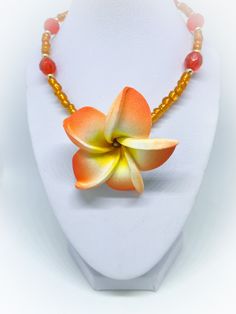 This is an Orange Foam Flower and Bright Orange Faceted Crystal and Orange Glass Seed Bead 16 inch Necklace.  This necklace comprises of a gorgeous centrepiece of a foam flower in orange and bright orange faceted glass beads and seed beads, interspersed with gold colour metal beads. A very contemporary fresh colour scheme. The colours are lovely and bright.  Handmade by myself a UK Jewellery designer. To view more JulieDeeleyJewellery items from my shop please click link below : http://www.etsy.com/shop/JulieDeeleyJewellery Follow me on Facebook: www.facebook.com/juliedeeleyjewellery Follow me on Twitter: @julie_deeley Follow me on Pinterest: pinterest.com/juliedeeley Follow me on Instagram: http://instagram.com/juliedeeley Orange Faceted Beads Jewelry For Gift, Orange Flower Pendant Necklace Gift, Orange Flower Pendant Necklace For Gift, Handmade Orange Flower Pendant Necklace, Orange Flower Pendant Jewelry Gift, Handmade Orange Necklace With Flower Pendant, Orange Flower Pendant Jewelry For Gift, Orange Flower Shaped Beaded Necklace For Gift, Orange Beaded Flower-shaped Jewelry