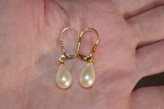 Vintage 14k gf 34 mm golden teardrop majorca pearl leverback earrings aaa welcome to my handmade store: hand made 14k gold filled 34 mm white perfect tear drop white / golden majorca pearl leverback earrings these earrings jackets are hobe old stock pearls from spain. they are from hobe comoany. some have discolorations but i cleaned them. some might have some not vidsible scraches or minor cracks on top drills, on the upper coating part which might not be seen on drill part they are true majorc Vintage Teardrop Pearl Earrings For Anniversary, Gold Pearl Lever Back Earrings For Formal Events, Vintage Gold Teardrop Pearl Earrings, Vintage Teardrop Pearl Earrings, Earrings Jackets, Golden Champagne, Earring Jackets, Majorca, Leverback Earrings