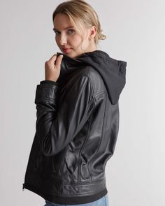 Made from 100% top grain leather, this jacket comes in a classic, timeless design. So comfortable and stylish, you'll be happy wearing it again and again. Read more about what makes our leather special in our Leather 101 guide.  | Quince | Women's Jacket with Hood in Black, Size Large, Leather Hooded Leather Outerwear For Work, Casual Fitted Leather Hooded Jacket, Leather Outerwear With Double-lined Hood, Leather Biker Jacket With Double-lined Hood, Fitted Leather Hooded Jacket For Fall, Fitted Leather Hooded Jacket With Double-lined Hood, Leather Jacket With Double-lined Hood, Fitted Leather Outerwear With Double-lined Hood, Leather Jacket With Detachable Hood For Fall