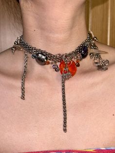 This unique multilayered necklace combines an eclectic mix of materials to create a statement piece that is both bold and stylish. With a total length of 33cm and an additional 12cm extender, this necklace features an array of glass beads, Czech beads, natural shell and horn elements, and stainless steel chains. The intricate design and diverse materials make it a standout accessory, perfect for adding a touch of edge to any outfit. Whether for a special event or everyday wear, this necklace is Multilayered Necklace, Multi Layer Necklace, Czech Beads, Intricate Design, Stainless Steel Chain, Multi Layering, Special Event, Pendant Necklaces, Favorite Jewelry