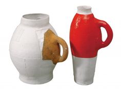 three vases with different shapes and sizes are shown in this image, one is red, the other white