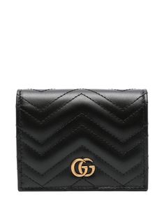 black calf leather smooth grain matelassé effect chevron stitching rectangle shape bi-fold design signature Double G logo logo plaque to the front embroidered logo to the rear note compartment internal card slots debossed internal logo internal zip-fastening pocket antique-effect hardware press-stud fastening This piece comes complete with a protective dust bag. Gucci Designer Wallets With Logo, Designer Gucci Wallets With Logo, Luxury Gucci Wallet With Logo, Gucci Rectangular Wallet With Rfid Blocking, Designer Gucci Wallet With Rfid Blocking, Gucci Luxury Wallets With Rfid Blocking, Gucci Luxury Wallet With Rfid Blocking, Luxury Gucci Wallet With Rfid Blocking, Gucci Leather Wallets With Rfid Blocking