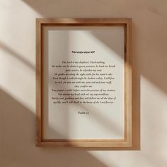 a wooden frame with a poem on it