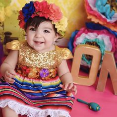 This Sparkly Cinco de Mayo Fiesta dress is limited to Belle Threads. A perfect combination of modern and glam for your Fiesta Princess. This gorgeous handmade dress features a red or gold options sequin bodice with flutter sleeves, a serape pink skirt with lace trim and crochet flowers trim in the front as pictured. They fit true to size. You are buying: Dress Romper from first photo made Red Sequin top or Gold Sequin top. Accessories like hat and shoes etc are not included. This listing is for Mexican Fiesta Dresses, Red Sequin Top, Sparkle Romper, Mexico Dress, Mexican Birthday Parties, Gold Sequin Top, Newborn Photo Outfits, Top Accessories, Sweet Pictures