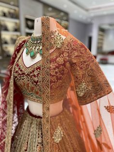 Elevate your bridal look with our Maroon Multi Color Bridal Lehenga BL-128, featuring intricate patch work and paired with beautiful heavy maroon dupta and rust orange dupta. Complete your dreamy ensemble with this unique and stunning lehenga. (Dreams do come true!) Fabric: Net with Raw Silk Lining! WASH CARE INSTRUCTIONS - Please Dry clean only when it is applicable! Ready to Ship! Meenakari Choli For Reception And Festivals, Bollywood Style Multicolor Anarkali Set With Intricate Embroidery, Raw Silk Meenakari Choli For Receptions, Bollywood Style Meenakari Lehenga For Reception, Bollywood Lehenga For Reception With Meenakari, Bollywood Meenakari Lehenga For Reception, Reception Choli With Multicolor Embroidery And Pallu, Semi-stitched Raw Silk Choli With Meenakari, Multicolor Embroidered Choli With Pallu For Reception