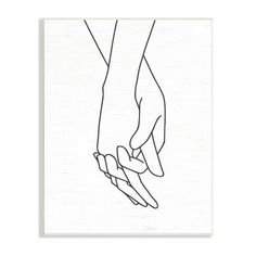 two hands holding each other's hand in black ink on white paper with the word love