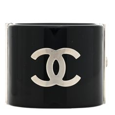 This is an authentic CHANEL Resin Pearl CC Cuff in Black.  This chic cuff crafted of solid black resin with a silver hinge and adorned with pearls and aChanel CC logo. Chanel Cuff Bracelet, Chanel Cuff, Resin Pearl, Chanel Jacket, Black Resin, Chanel Jewelry, Bracelet Black, Cc Logo, Vintage Bracelets