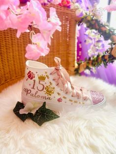 A perfect gift, Quinceañera Hand-made Sneakers, for the celebration of a girl's 15th birthday, marking her passage from girlhood to womanhood. Make a statement with stunning decorated sneakers custom canvas sneakers, bedazzled with rhinestones, glitter, and other beautiful details. 🌟Includes🌟 - Pick shoelace colors.  - The toe top is covered with bright rhinestones. - On the sides of the shoe (right & left), the idea/name/date is printed in solid or glitter color. - Flowers & crown decorating Custom Quince Shoes, Quinceanera Shoes Heels, Decorated Sneakers, Sweet 16 Shoes, Quince Shoes, Rose Gold Quince, Light Pink Sneakers, Quinceanera Shoes, Quinceanera Pink