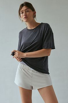 Better-than-basic Out From Under tee in a slouchy, oversized fit. Designed with a crew neckline, drop shoulders and short sleeves with raw, rolled edges for a relaxed finish. Only at Urban Outfitters. Features Out From Under Taylor oversized crew neck tee Oversized t-shirt Soft and stretchy knit Crew neckline with drop shoulders and short sleeves with raw, rolled edges Raw, rolled hemline Relaxed, oversized fit Regular length UO exclusive Content + Care 100% Cotton Machine wash Imported Size + F Oversized Cropped Crew Neck T-shirt For Everyday, Relaxed Fit Washed Black Short Sleeve Tops, Relaxed Drop Shoulder Everyday T-shirt, Relaxed Soft-washed T-shirt With Shirttail Hem, Relaxed Fit Washed Black Tops, Casual Relaxed Fit Crew Neck Top, Effortless Soft-washed Crew Neck Top, Relaxed Fit Soft-washed T-shirt With Scoop Neck, Relaxed Fit Short Sleeve Top