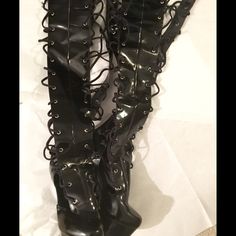 Hey Dolls Enjoy These Previously Loved Sexy Lace Platform Boots. Fits Size 8 Comfortably 6" Heel With Platform Any Questions Please Ask Before Purchase No Paypal || No Trades || Posh Rules Only Shipping: Bundle And Save On Shipping Items Are Shipped Within 24-48 Hours Of Payment (Mon-Sat) Please Check Out My Other Listings For The Best In Brand New And Gently Used Clothing, Shoes And Accessories. Happy Poshing Gothic Black Heels For Party, High Cut Faux Leather Boots For Party, Fitted Synthetic Punk Platform Boots, Lace-up Synthetic Platform Boots For Party, Synthetic Lace-up Platform Boots For Party, Polyurethane Platform Boots For Party, Gothic Black Heels For Night Out, Punk Lace-up Heels For Party, Punk Lace-up Party Heels