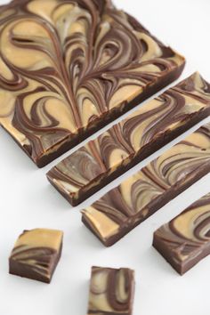 four pieces of chocolate and caramel swirled fudge