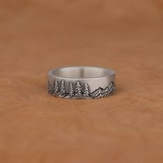 Mountains and Pine Trees Forest Art Ring Silver Ring,  Minimalist 925 Sterling Silver Oxidized Engagement Ring, Nature Inspired Jewelry Gifts ✅ Handcrafted with love and joy, this ring will be with you for years to come, possibly even taking its place as a family heirloom for generations to come!  ✅ With its detailed handmade engravings, this silver ring will catch some serious attention and make a beautiful gift for your beloved ones. ✅ It's very elegant and classy for everyday use but also can Minimalist Etched Jewelry For Anniversary, Sterling Silver Etched Jewelry For Promise, Stamped Sterling Silver Open Ring, Minimalist Stamped Jewelry For Promise Ring, Stamped Sterling Silver Open Ring Jewelry, Minimalist Stamped Promise Ring, Nature-inspired Etched Rings Ideal For Gifts, Minimalist Etched Rings For Promise, Minimalist Etched Anniversary Rings