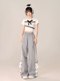 A pair of nylon pants with ribbons that create a uniquely cute look.

A trendy item that creates an impactful look and expresses your individuality.

The exquisite balance of street and girly makes it stand out from the rest.
◾️Model
Height/Weight：160cm(62.9in)/45kg(99.2lb)
Fitting Size：S





Cm
(inches)

Length
Waist
Hip


S
102(40.1)
62(24.4)
110(43.3)


M
104(40.9)
66(25.9)
114(44.8)


L
106(41.7)
70(27.5)
118(46.4)


XL
108(42.5)
74(29.1)
122(48.0) Aria Outfits, Chinese Street Style, Tomboy Look, Nylon Pants, Cute Pants, Big Girl Fashion, Preppy Casual, Really Cute Outfits, Harajuku Fashion