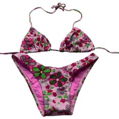 Brazilian Bright Floral Print Bikini Set. Bright Multi Flowers Design Adjustable Triangle Bikini Top And Matching Bright Wide Band Bikini Bottom. Sexy Flowers Bikini Set. Runs Small I Recommended To Order One Size Up. Made In Brazil. Pattern Placement Differs On Each Set A84 16521-903 A57 #Brazilianbikini #Bikini #Swimsuit #Brightfloralbikini #Tropicalbikini Pink Fitted Swimwear For The Pool, Fitted Pink Swimwear For Spring, Pink Fitted Swimwear For Pool, Fitted Pink Swimwear For The Pool, Fitted Pink Swimwear For Pool, Pink Tropical Floral Print Swimwear, Pink Stretch Summer Swimwear, Pink Tropical Swimwear With Floral Print, Stretch Pink Summer Swimwear