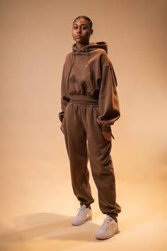 Our bestseller of all time. Sizes XS, S, M, L, and XL are available for order. The set is already oversized, so do not go a size up. Models are wearing size S. The hoodie is cropped but comfortable and not too short. The sleeves and long and puffy. The joggers are high waisted and we call them the Jasmine joggers, they fit exactly like the pants of the cartoon character. Both the joggers and hoodies are made of cotton/poly blend (40% cotton and 60% poly) with a comfy fleece inside. The ultimate Hoodie And Sweatpants Set, Matching Tracksuit, Sweatpants And Hoodie, Hoodie And Joggers, Joggers Set, Joggers Outfit, Womens Hoodies, Hoodie And Sweatpants, Hoodie Set