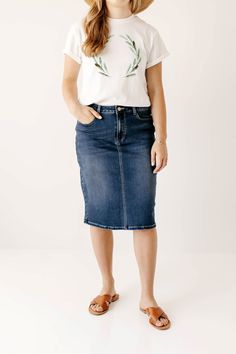 Every modest denim collection needs a classic no-fuss dark wash denim skirt! The 'Scout' denim skirt features a simple design, a modest knee-length, and working pockets for life on the go! The knit denim with belt loops ensures a flattering fit for a variety of body types. Style with a graphic tee and sneakers for an effortless vibe. Perfect for your everyday activities or traveling the world! Exclusively designed by us, for you! 85% Cotton 10% Polyester 5% Spandex Wash Cold Gentle Cycle Hang to Cute Modest Outfits, Outfits Modest, Knit Denim, Denim Collection, Dark Wash Denim, Jean Skirt, Main Street, Modest Outfits, Skirt Outfits