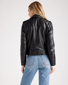 Biker chic incoming. Crafted from 100% top grain leather in a totally timeless design. This leather motorcycle jacket is unbelievably soft, and super stylish. Epaulette shoulders and robust zip details on the sleeves and pockets give it an edgy feel. Plus the pockets are spacious and usable. Fully lined with a poly satin in a slim cut, with belted hem. Read more about what makes our leather special in our Leather 101 guide.  | Quince | Women's Motorcycle Jacket in Black, Size Large, Leather Cashmere Robe, Motorcycle Jacket Women, Biker Chic, Cashmere Wrap, Leather Motorcycle Jacket, Leather Biker Jacket, Biker Style, Leather Pulls, Nice Leather