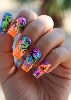 Immerse yourself in the tropical allure of Hawaiian nail designs, featuring vibrant hues, floral patterns, and beach-inspired motifs, as highlighted in our dedicated article on Hawaiian nail art. Click to explore a paradise of colorful and playful styles, perfect for adding a touch of island charm to your look, and follow us for a daily dose of creative nail inspiration. For a wide array of stunning and thematic designs, be sure to visit nailhow.com!" Hawaiian Nail Art, 2023 Nails Ideas, Aloha Nails, Vibrant Nail Designs, Vacay Nails, Summer Nails Simple, Strawberry Nail Art, Tropical Nail Art