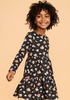 JustFab Black Floral female Fashion >> Kids >> Girls >> Clothing >> Dresses & Rompers regular Fit: Semi-fitted bodice. Length: Hits mid-thigh. Fabric: 60% Cotton, 40% Polyester. Machine Wash Cold. Imported. Keep things sweet with this floral dress. The dark blooms are the perfect complement to the season. Plus, the style is complete with darling tiers. Ditsy Floral Tiered Dress Fitted Floral Print Fall Dress, Floral Print Stretch Mini Dress Knee-length, Fitted Floral Print Dress For Fall, Casual Fitted Long Sleeve Floral Dress, Fitted Casual Floral Dress For Fall, Fitted Black Floral Long Sleeve Dress, Casual Black Dress With Fitted Waist, Kids Fashion Girl, Female Fashion