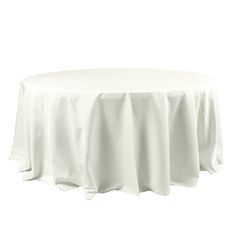 a round table with white cloth on it