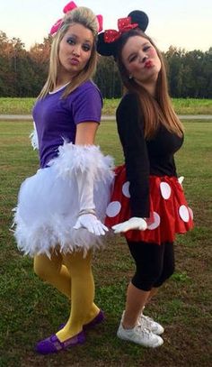 two girls dressed up as minnie and mickey mouse