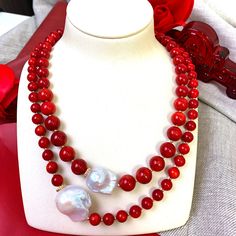 This handmade necklace is made of red corals with baroque pearls with Japan golden plated brass findings. It's beautiful and brilliant and can be matched with a midi dress, tube top, or knitwear from day to night for any occasion. Match it with Farra earrings to complete your look. Also, this is a very nice gift for birthdays, anniversaries or festivals. It will be contained in a nice jewelry box. Elegant Red Beaded Pearl Necklace, Elegant Single Strand Red Coral Necklaces, Elegant Red Coral Round Bead Necklaces, Elegant Red Coral Round Bead Necklace, Elegant Single Strand Red Coral Necklace, Elegant Red Pearl Necklace With Gemstone Beads, Elegant Red Coral Necklace For Formal Occasions, Elegant Red Coral Necklace For Formal Events, Elegant Red Pearl Necklace Gift