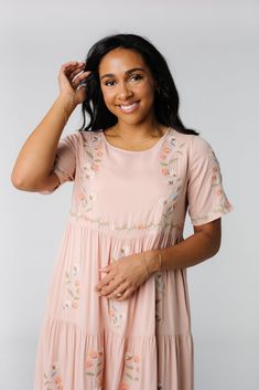 Lovely floral embroidered dress Lightweight woven Round neckline Short sleeves with embroidery Multiple gathered tiers Side pockets Lined Fabric content - Rayon - Hand wash recommended Spring Dress With Embroidered Hem, Spring Embroidered Cotton Dress, Cheap Cotton Embroidered Dress With Short Sleeves, Cheap Casual Embroidered Dress, Casual Dresses With Embroidered Hem, Cheap Casual Cotton Embroidered Dress, Grandma Dress, Knit Fabric Dress, Dusky Skin