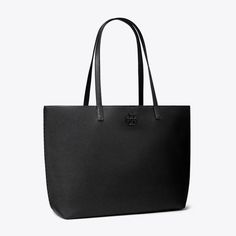 Crafted in pebbled leather, the McGraw Large Tote Bag in Black exudes effortless elegance. Its spacious interior offers room for all your essentials, including a laptop, while the die-cut Double T adds a touch of sophistication. Upgrade your style with this understated chic tote. Sleek Textured Leather Bag For Everyday, Black Saffiano Leather Bag For Daily Use, Black Saffiano Leather Shoulder Bag With Smooth Grain, Saffiano Leather Bag For On-the-go, Minimalist Textured Leather Travel Bag, Black Saffiano Leather Tote Shoulder Bag, Saffiano Leather Tote Bags For Shopping, Minimalist Textured Leather Work Bag, Sleek Textured Leather Travel Bag