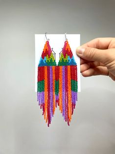 Colorful Beaded Earrings Fringe Seed Bead Earrings Multicolor - Etsy Ukraine Rainbow Beaded Earrings For Festivals, Multicolor Dangle Beads With Ear Wire, Festival Rainbow Beaded Earrings, Beaded Rainbow Drop Earrings, Rainbow Beaded Earrings With Tiny Beads For Festivals, Rainbow Beaded Drop Earrings, Rainbow Beaded Drop Earrings With Dangling Beads, Multicolor Beaded Chain Dangle Beads, Rainbow Dangle Earrings With Tiny Beads