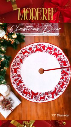 the modern christmas placemat is on display next to a tree with presents around it