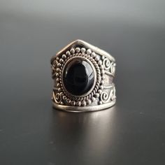 Solid sterling silver ring Stamped and tested Black onyx gemstone UK ring size T1/2 USA ring size 10 ENJOY FREE TRACKED SHIPPING WITHIN THE UK ENJOY FREE INTERNATIONAL TRACKED SHIPPING  I meticulously test all my solid sterling silver jewellery for authenticity, ensuring quality regardless of the presence of the 925 stamp.  While the test mark is typically found inside the shank, it may be  polished off on earrings and pendants if it becomes too noticeable. Any other silver or alloys used will be mentioned in the description  My photos also serve as descriptions, so please carefully examine them. I make every effort to provide accurate descriptions and sizing for all items i sell. Do keep in mind that these items are vintage, not brand new. Vintage items may have imperfections, as is commo Unique Black Crystal Ring In Sterling Silver, Handmade Black Crystal Ring In Sterling Silver, Gothic Black Ring Stamped 925, Gothic Onyx Ring With Gemstone, Black Bohemian Rings With Gemstone, Gothic Onyx Gemstone Ring, Black Bohemian Gemstone Rings, Bohemian Black Gemstone Rings, Nickel-free Black Bohemian Rings