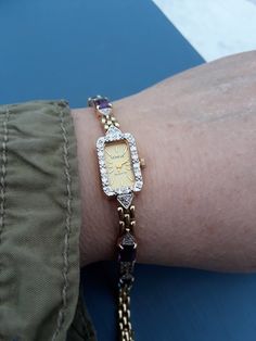 Absolutely Stunning 14k Yellow Gold, Diamond, Amethyst, Blue Topaz Ladies Wrist Watch. Geneva, very good Vintage Pre Owned Condition. Yellow Gold Diamond Jewelry And Watches As Gift, Diamond Yellow Gold Jewelry As Gift, Elegant Gold Gemstones With Polished Finish, Gold Amethyst Jewelry With Stones, Formal Yellow Gold Jewelry With Stones, Hallmarked Yellow Gold Jewelry And Watches As Gift, Diamond Gold Bracelet With Polished Finish As Gift, Gold Diamond Multi-stone Bracelets, Luxury Rectangular Amethyst Jewelry