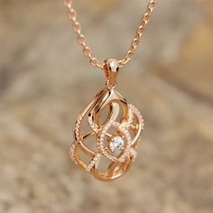 Material: 18K Rose Gold Vermeil Color: Rose Gold Gemstone: Moissanite Gemstone Size: 5.0mm*5.0mm Width: 26.0mm High: 49.0mm *It is recommended to wipe the necklace regularly to maintain its luster, avoid contact with chemicals, and store it properly to avoid scratches or damage. Elegant Pendant Turquoise Necklace Collectible, Luxury Agate Nature-inspired Necklaces, Elegant Horse Design Pendant Jewelry, Luxury Horse Design Pendant Necklace, Gold Horse Design Pendant Necklace, Round Moissanite, Eden, Men's Rings, 18k Rose Gold